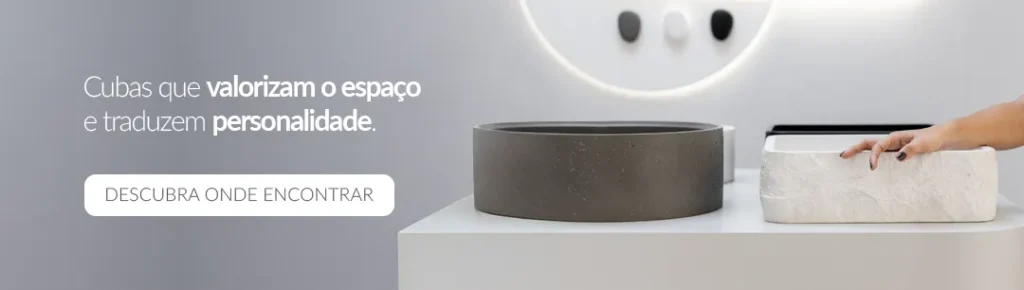 Banheiros modernos Doka: banner com duas cubas de apoio sobre bancada branca — cuba redonda em granilite cinza grafite e cuba retangular em mármore branco com veios naturais e texto 'Cubas que valorizam o espaço e traduzem personalidade. descubra onde encontrar'.