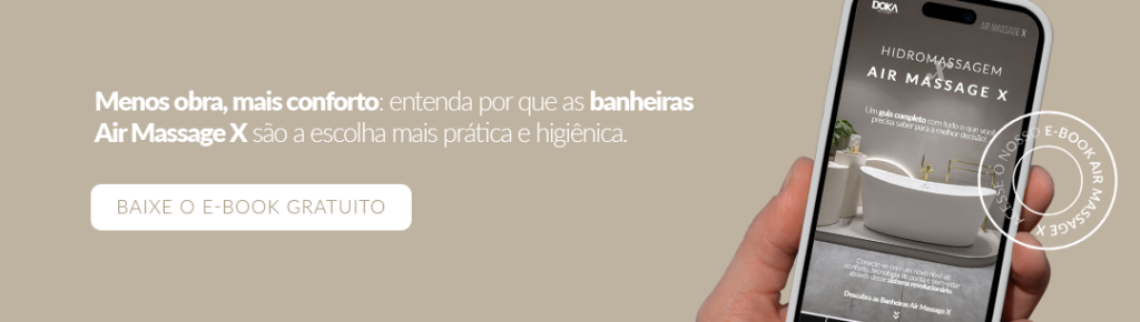imagem com fundo bege, uma mão segurando um celular com o e-book doka aberto e a frase ao lado: Menos obra, mais conforto: entenda por que as banheiras Air Massage X são a escolha mais prática e higiênica. botão CTA para ação: Baixe o e-book gratuito"