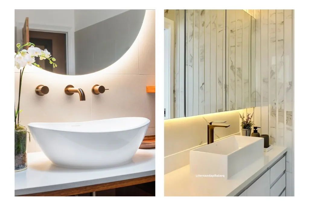 Duas pias de banheiro modernas. À esquerda, pia oval branca sobre bancada com torneira de parede em tom dourado e espelho redondo iluminado, criando o espelho ideal para banheiro. À direita, pia retangular branca sobre bancada clara com torneira preta e espelho longo iluminado, em ambiente clean e funcional.